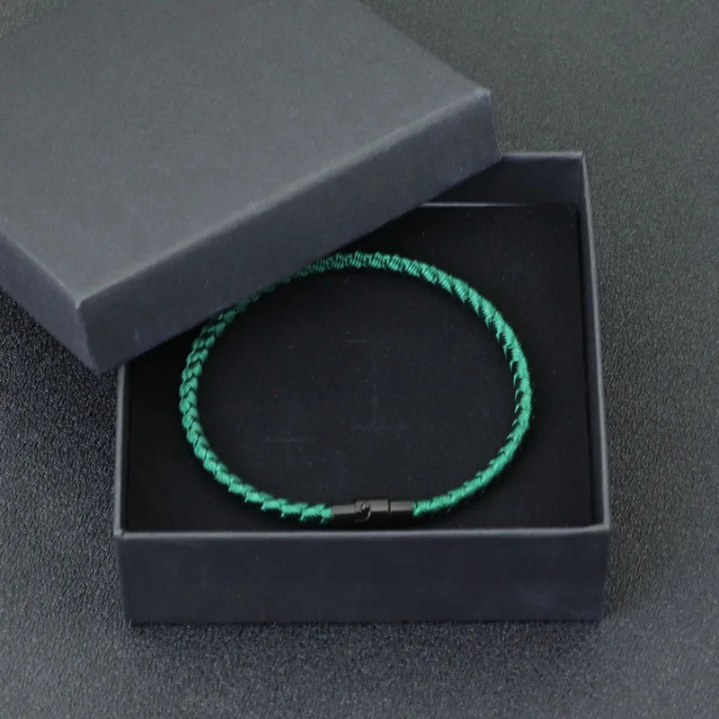GELUKS KOORD ARMBAND (UNISEX)